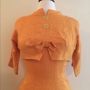 Vintage sorbet orange 1950s wiggle dress